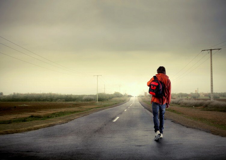 bigstock-Young-man-walking-on-a-country-13798088